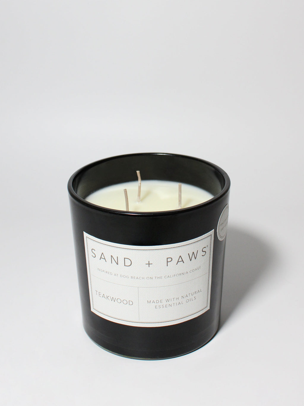 Premium Sand + Paws Teakwood 21 oz scented candle