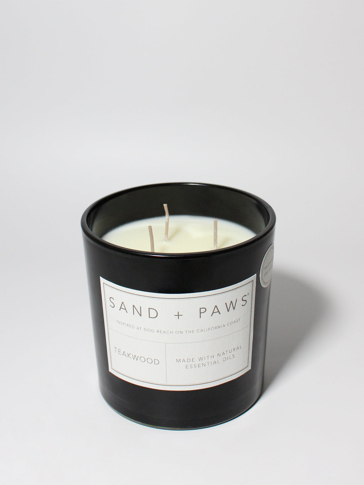 Premium Sand + Paws Teakwood 21 oz scented candle